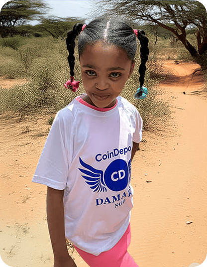 A child wearing a CoinDepo charity T-shirt