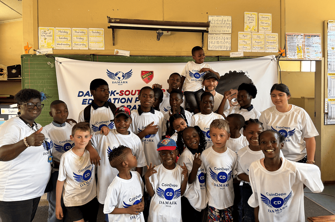 Children and volunteers at a CoinDepo charity event