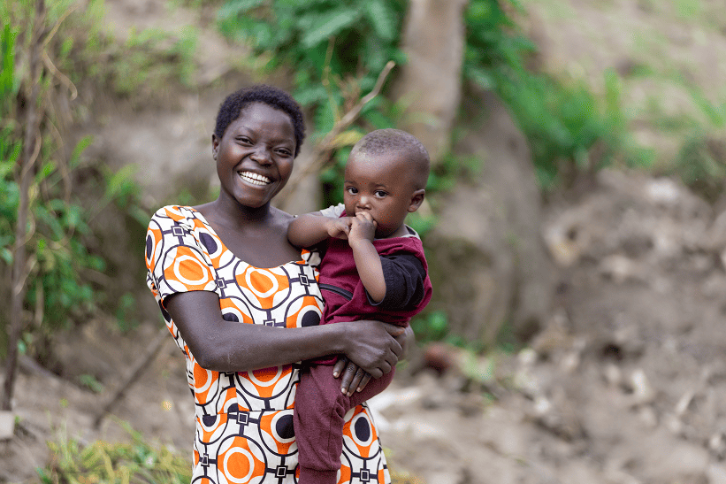 Sophie and a child in Rwanda