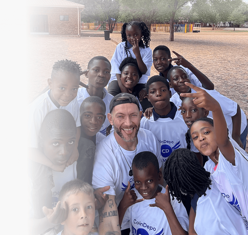 CoinDepo charity volunteers and children together